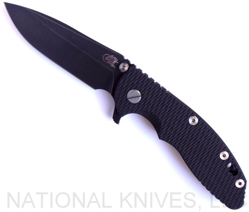 Rick Hinderer Knives XM-18 3.5" Spear Point folding knife with thumb stud and flipper tab - shown open presentation side.  Battle Black 20CV stainless steel plain edge blade.  Black G-10 handle with Battle Black lock side.  Model K2082SGDSW.