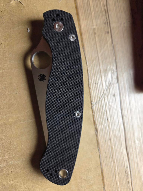 Blemished Spyderco Military 2 folding knife with thumb hole - shown closed presentation side.  Satin S30V stainless steel combo edge blade.  Black G-10 handle.  Model C36GPS2.