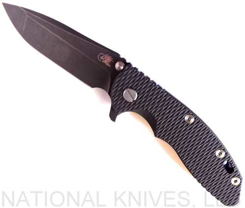 Rick Hinderer Knives XM-18 3.5" Spanto folding knife with thumb stud and flipper tab - shown open presentation side.  Battle Black 20CV stainless steel plain edge blade.  Black G-10 handle with Battle Black lock side.  Model K2002SGDSW.