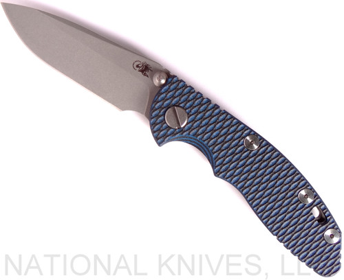 Rick Hinderer Knives XM-18 3.0" Spear Point Non Flipper folding knife with thumb studs - shown open presentation side.  Working Finish 20CV stainless steel plain edge blade.  Blue - black G-10 handle with Working Finish lock side.  Model K10813SGW00.