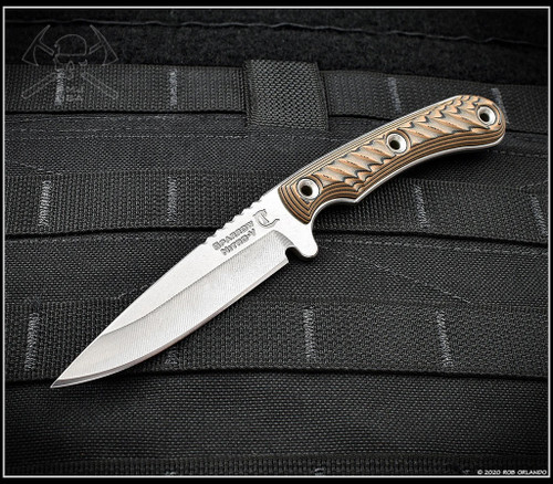 RMJ Tactical Sparrow fixed blade knife - shown out of sheath reverse.  Stonewash Nitro-V stainless steel plain edge blade.  Hyena Brown G-10 handle.
For reference only.