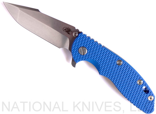 Rick Hinderer Knives XM-18 3.5" Harpoon Spanto folding knife with thumb stud and flipper tab - shown open presentation side.  Stonewash 20CV stainless steel plain edge blade.  Blue G-10 handle with stonewash blue lock side.  Model K2552SGS00.