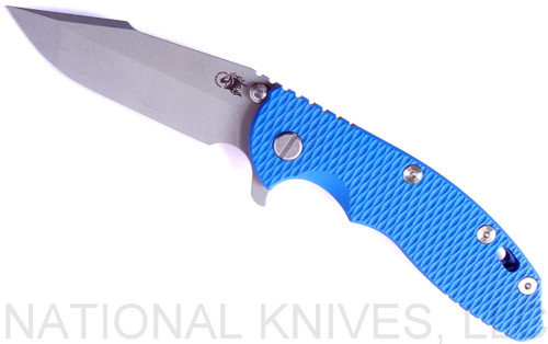Rick Hinderer Knives XM-18 3.5" Harpoon Spanto folding knife with thumb stud and flipper tab - shown open presentation side.  Working Finish 20CV stainless steel plain edge blade.  Blue G-10 handle with Battle Blue lock side.  Model K2552SGW00.