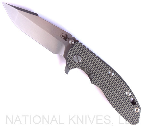 Rick Hinderer Knives XM-18 3.5" Harpoon Spanto folding knife with thumb stud and flipper tab - shown open presentation side.  Stonewash 20CV stainless steel plain edge blade.  OD green - black G-10 handle with stonewash bronze lock side.  Model K2552SGS00.