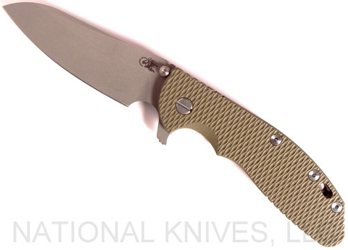 Rick Hinderer Knives XM-24 Sheepsfoot folding knife with thumb stud and flipper tab - shown open presentation side.  Working Finish 20CV stainless steel plain edge blade.  OD green G-10 handle with Battle Bronze lock side.  Model K3073SGW00.
