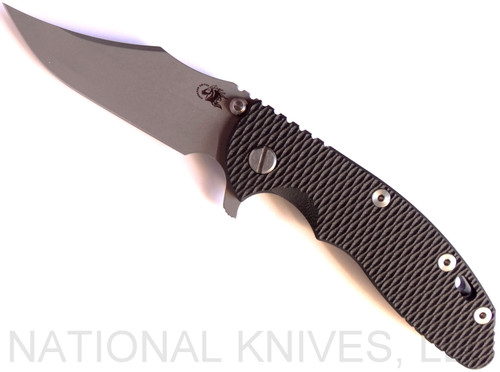 Rick Hinderer Knives XM-18 3.5" Bowie folding knife with thumb stud and flipper tab - shown open presentation side.  Working Finish 20CV stainless steel plain edge blade.  Black G-10 handle with Working Finish titanium lock side.  Model K2032SGW00.