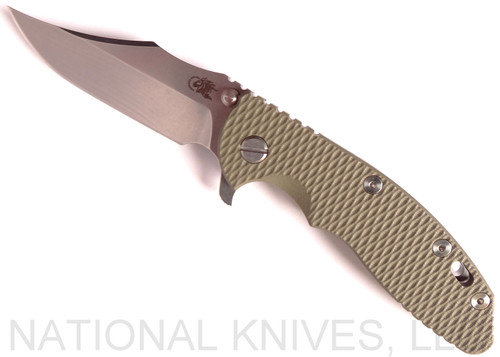 Rick Hinderer Knives XM-18 3.5" Bowie folding knife with thumb stud and flipper tab - shown open presentation side.  Stonewash 20CV stainless steel plain edge blade.  OD green G-10 handle with stonewash titanium lock side.  Model K2032SGS00.