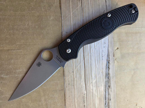 Blemished Spyderco Paramilitary 2 folding knife with thumb hole - shown open presentation side.  Satin CTS-BD1N stainless steel plain edge blade.  Black FRN handle.  Model C81PBK2.