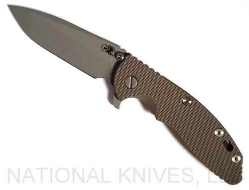 Rick Hinderer Knives XM-18 3.5" Spanto folding knife with thumb stud and flipper tab - shown open presentation side.  Working Finish S45VN stainless steel plain edge blade.  FDE G-10 handle with Battle Bronze lock side.  Model K2002SGW00.