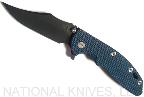 Rick Hinderer Knives XM-18 3.5" Bowie folding knife with thumb stud and flipper tab - shown open presentation side.  Battle Black 20CV stainless steel plain edge blade.  Blue - black G-10 handle with Battle Black titanium lock side.  Model K20320SNNC.
