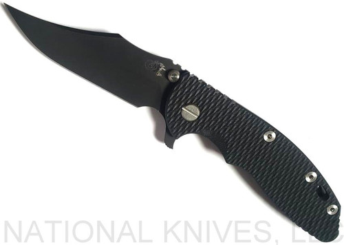 Rick Hinderer Knives XM-18 3.5" Bowie folding knife with thumb stud and flipper tab - shown open presentation side.  Battle Black 20CV stainless steel plain edge blade.  Black G-10 handle with Battle Black titanium lock side.  Model K20320SNNC.