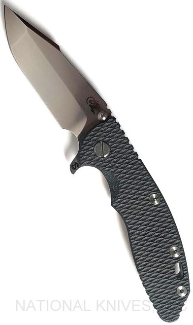 Rick Hinderer Knives Skinny XM-18 3.5" Harpoon Spanto folding knife with thumb stud and flipper tab - shown open presentation side.  Stonewash 20CV stainless steel plain edge blade.  Black G-10 handle with stonewash lock side.  Model K2555SGS00.