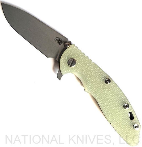 Rick Hinderer Knives XM-18 3.5" Slicer folding knife with thumb stud and flipper tab - shown open presentation side.  Working Finish 20CV stainless steel plain edge blade.  Translucent Green G-10 handle with Working Finish lock side.  Model K310102001.