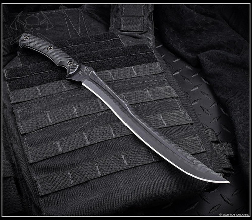 RMJ Tactical Drake fixed blade knife - shown out of sheath 3V Syndicate logo side.  Textured Black 3V steel plain edge blade.  Black G-10 handle scales.  Model 3V-DR-BT-BK.