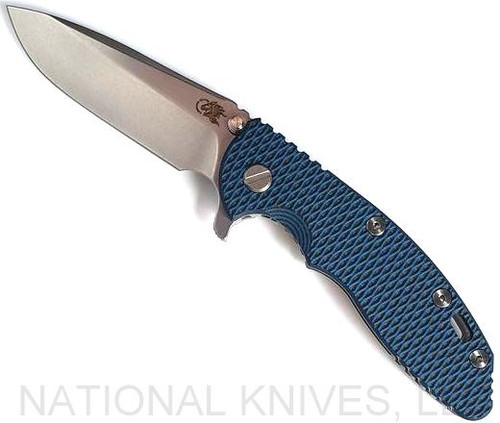 Rick Hinderer Knives XM-18 3.5" Spear Point folding knife with thumb stud and flipper tab - shown open presentation side.  Stonewash 20CV stainless steel plain edge blade.  Blue - black G-10 handle with stonewash lock side.  Model KXM35SPE.