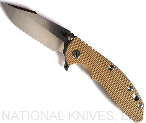Rick Hinderer Knives Skinny XM-18 3.5" Harpoon Spanto folding knife with thumb stud and flipper tab - shown open presentation side.  Stonewash 20CV stainless steel plain edge blade.  Coyote G-10 handle with stonewash blue lock side.  Model KXM35SKHS.