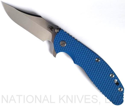 Rick Hinderer Knives XM-24 Bowie folding knife with thumb stud and flipper tab - shown open presentation side.  Stonewash 20CV stainless steel plain edge blade.  Blue G-10 handle with stonewash lock side.  Model KXM40BO.