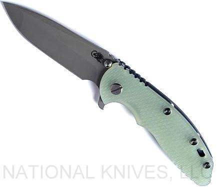 Rick Hinderer Knives XM-18 3.5" Spanto folding knife with thumb stud and flipper tab - shown open presentation side.  Working Finish S45VN stainless steel plain edge blade.  Translucent Green G-10 handle with Battle Blue lock side.  Model KXM35SPA.