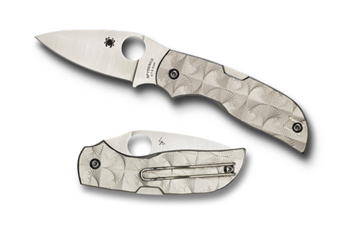 Spyderco Chaparral folding knife with thumb hole - shown open presentation side and closed pocket clip side.  Satin CTS-XHP stainless steel plain edge blade. Stepped titanium handle.  Model C152STIP.
For reference only.