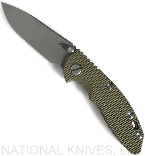 Rick Hinderer Knives Non=Flipper XM-18 3.0" Slicer folding knife with thumb stud - shown open presentation side.  Working Finish 20CV stainless steel plain edge blade.  OD green G-10 handle with Battle Bronze lock side.  Model KXM30SLNF.