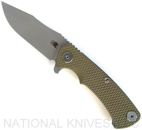 Rick Hinderer Knives Project X Clip Point folding knife with flipper tab - shown open presentation side.  Working Finish MagnaCut stainless steel plain edge blade.  OD green G-10 handle with Working Finish lock side.  Model KPXSPEMC.