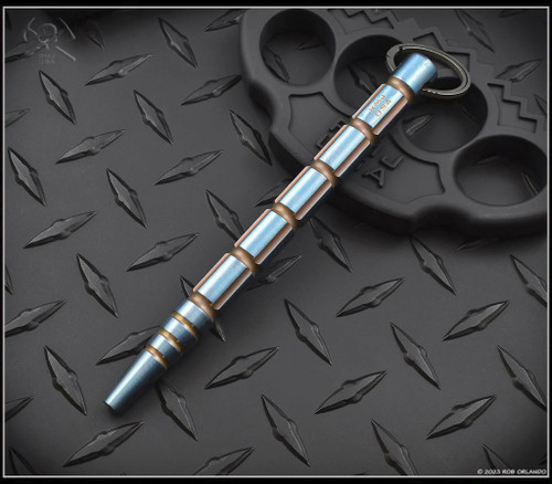 RMJ Tactical Pokey Boi Kubaton tool.  Anodized blue and bronze titanium construction.  Model A-KU-PB-ANO-BL-CO.