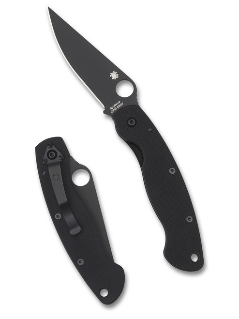 Spyderco Military folding knife with thumb hole - shown open presentation side and closed pocket clip side.  Black S30V stainless steel plain edge blade.  Black G-10 handle.  Model C36GPBK.