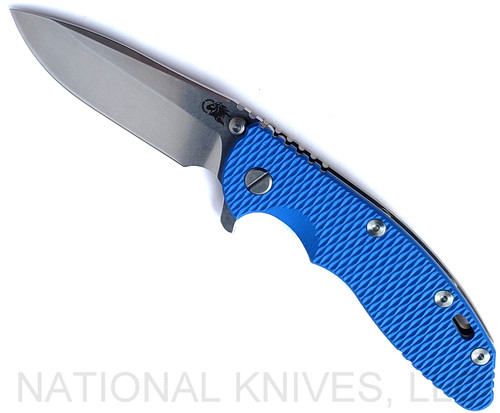 Rick Hinderer Knives XM-18 3.5" Spear Point folding knife with thumb stud and flipper tab - shown open presentation side.  Stonewash 20CV stainless steel plain edge blade.  Blue G-10 handle with stonewash bronze lock side.  Model KXM35SPE.