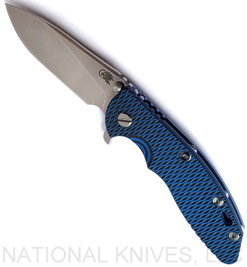 Rick Hinderer Knives XM-18 3.5" Slicer folding knife with thumb stud and flipper tab - shown open presentation side.  Stonewash S45VN stainless steel plain edge blade.  Blue - black G-10 handle with stonewash blue lock side.  Model KXM35SL.