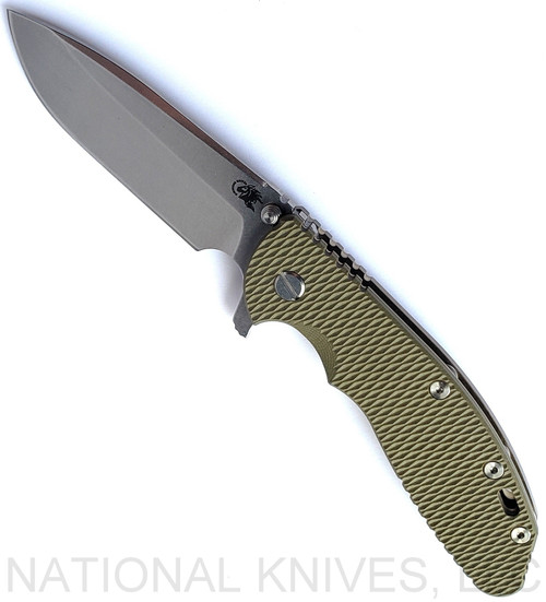 Rick Hinderer Knives XM-24 Spear Point folding knife with thumb stud and flipper tab - shown open presentation side.  Stonewash S45VN stainless steel plain edge blade.  OD green G-10 handle with stonewash bronze lock side.  Model KXM40SPE.