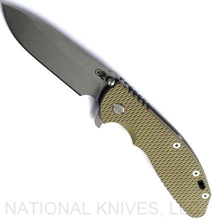 Rick Hinderer Knives XM-24 Spear Point folding knife with thumb stud and flipper tab - shown open presentation side.  Working Finish S45VN stainless steel plain edge blade.  OD green G-10 handle with Battle Bronze lock side.  Model KXM40SPE.