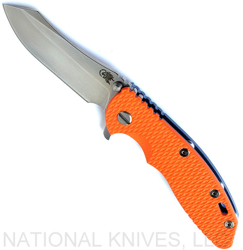 Rick Hinderer Knives XM-18 3.5" Skinner folding knife with thumb stud and flipper tab - shown open presentation side.  Stonewash S45VN stainless steel plain edge blade.  Orange G-10 handle with stonewash blue lock side.  Model KXM35SKINNER.