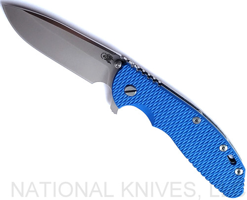 Rick Hinderer Knives XM-24 Spear Point folding knife with thumb stud and flipper tab - shown open presentation side.  Stonewash S45VN stainless steel plain edge blade.  Blue G-10 handle with stonewash lock side.  Model KXM40SPE.