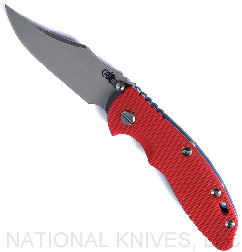 Rick Hinderer Knives Non Flipper XM-18 3.5" Bowie folding knife with thumb stud - shown open presentation side.  Working Finish S45VN stainless steel plain edge blade.  Red G-10 handle with Battle Blue lock side.  Model KXM35NFBOW.
