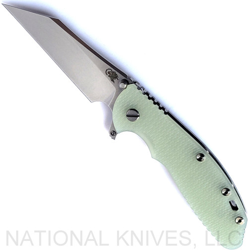 Rick Hinderer Knives Skinny XM-24 Wharncliffe folding knife with thumb stud and flipper tab - shown open presentation side.  Stonewash S45VN stainless steel plain edge blade.  Translucent Green G-10 handle with stonewash lock side.  Model KXM40SKWC.