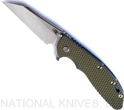 Rick Hinderer Knives Skinny XM-24 Wharncliffe folding knife with thumb stud and flipper tab - shown open presentation side.  Stonewash S45VN stainless steel plain edge blade.  OD green G-10 handle with stonewash blue lock side.  Model KXM40SKWC.