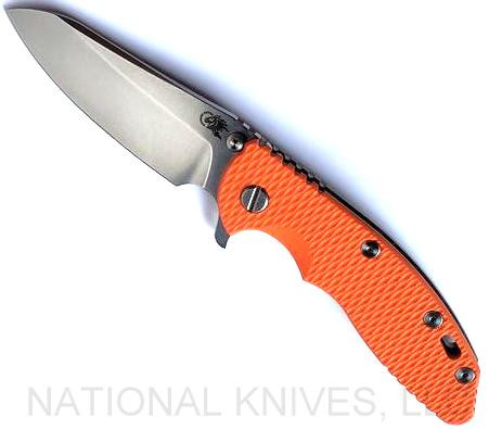 Rick Hinderer Knives XM-18 3.5" Sheepsfoot folding knife with thumb stud and flipper tab - shown open presentation side.  Stonewash S45VN stainless steel plain edge blade.  Orange G-10 handle with stonewash bronze lock side.  Model KXM35SHF.