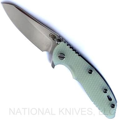 Rick Hinderer Knives XM-18 3.5" Sheepsfoot folding knife with thumb stud and flipper tab - shown open presentation side.  Stonewash S45VN stainless steel plain edge blade.  Translucent Green G-10 handle with stonewash blue lock side.  Model KXM35SHF.
