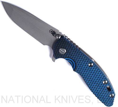 Rick Hinderer Knives XM-18 3.5" Spanto folding knife with thumb stud and flipper tab - shown open presentation side.  Working Finish S45VN stainless steel plain edge blade.  Blue - black G-10 handle with Battle Bronze lock side.  Model KXM35SPA.