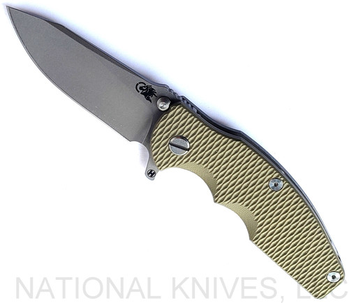 Rick Hinderer Knives Jurassic Hollow Grind Slicer folding knife with flipper tab - shown open presentation side.  Working Finish MagnaCut stainless steel plain edge blade.  OD Green G-10 handle scale with Working Finish titanium lock side.  Model KJURSLHO.