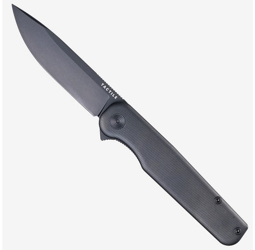 Tactile Knife Co Rockwall Flipper folding knife with flipper tab - shown open presentation side.  Black DLC MagnaCut stainless steel plain edge blade.  Black DLC titanium handle.  Model 20-RW-MCDL-TTDL.