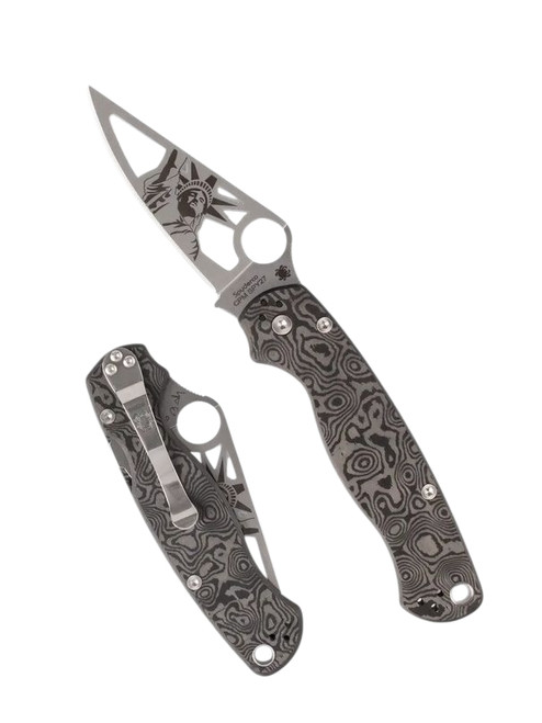 Spyderco Paramilitary 2 Stature of Liberty HL Dalis Exclusive folding knife with thumb hole - shown open presentation side and closed pocket clip side.  Satin SPY27 stainless steel plain edge blade.  Black Dunes FatCarbon handle.  Model C81CFSPY27P2.
