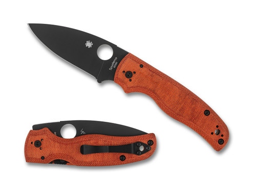 Spyderco Shaman Sprint Run folding knife with thumb hole - shown open presentation side and closed pocket clip side.  Black M390 stainless steel plain edge blade.  Orange Micarta handle.  Model C229MORM390BKP.