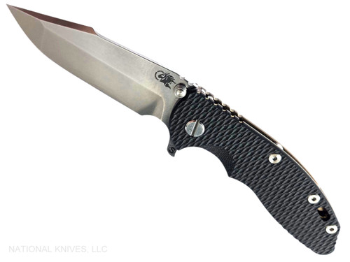 Rick Hinderer Knives XM-18 Skinny Harpoon Spanto with thumb stud and flipper tab - shown open presentation side.  Stonewash MagnaCut stainless steel plain edge blade.  Black G-10 handle with stonewash bronze lock side.  Model KXM35SKHS.