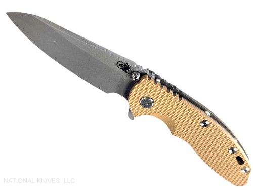 Rick Hinderer Knives XM-18 3.5" Sheepsfoot folding knife with thumb stud and flipper tab - shown open presentation side.  Working Finish S45VN stainless steel plain edge blade.  Coyote G-10 handle with Battle Bronze lock side.  Model KXM35SHF.