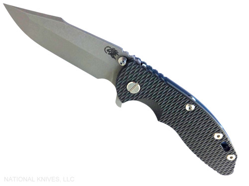 Rick Hinderer Knives XM-18 3.5" Harpoon Spanto folding knife with thumb stud and flipper tab - shown open presentation side.  Working Finish MagnaCut stainless steel plain edge blade.  Black G-10 handle with Battle Blue lock side.  Model KXM35HS.