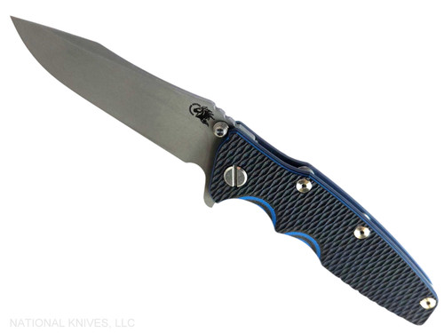 Rick Hinderer Knives Eklipse Spear Point folding knife with flipper tab and thumb stud - shown open presentation side.  Working Finish S45VN stainless steel plain edge blade.  Blue - black G-10 handle with Battle Blue lock side.  Model KEK35SPE.