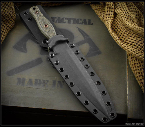 RMJ Tactical Kilroy fixed blade knife - shown in sheath obverse.  OD Green Cerakote M390 steel, double plain edge, blade.  Dirty Olive G-10 handle scales. Model K-KRY-M390-ODG-DO.