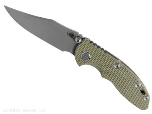 Rick Hinderer Knives XM-18 Non Flipper 3.0" Bowie folding knife with thumb stud - shown open presentation side.  Working Finish 20CV stainless steel plain edge blade.  OD Green G-10 handle with Battle Bronze lock side.  Model KXM30BOWNF.