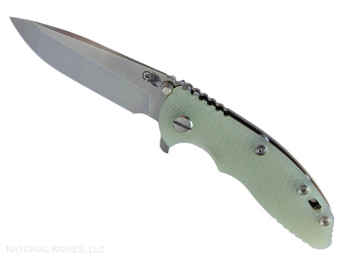 Rick Hinderer Knives XM-18 3.25" Spanto folding knife with thumb stud and flipper tab - shown open presentation side.  Stonewash MagnaCut stainless steel plain edge blade.  Translucent Green G-10 handle with stonewash bronze lock side.  Model KXM325SPA.